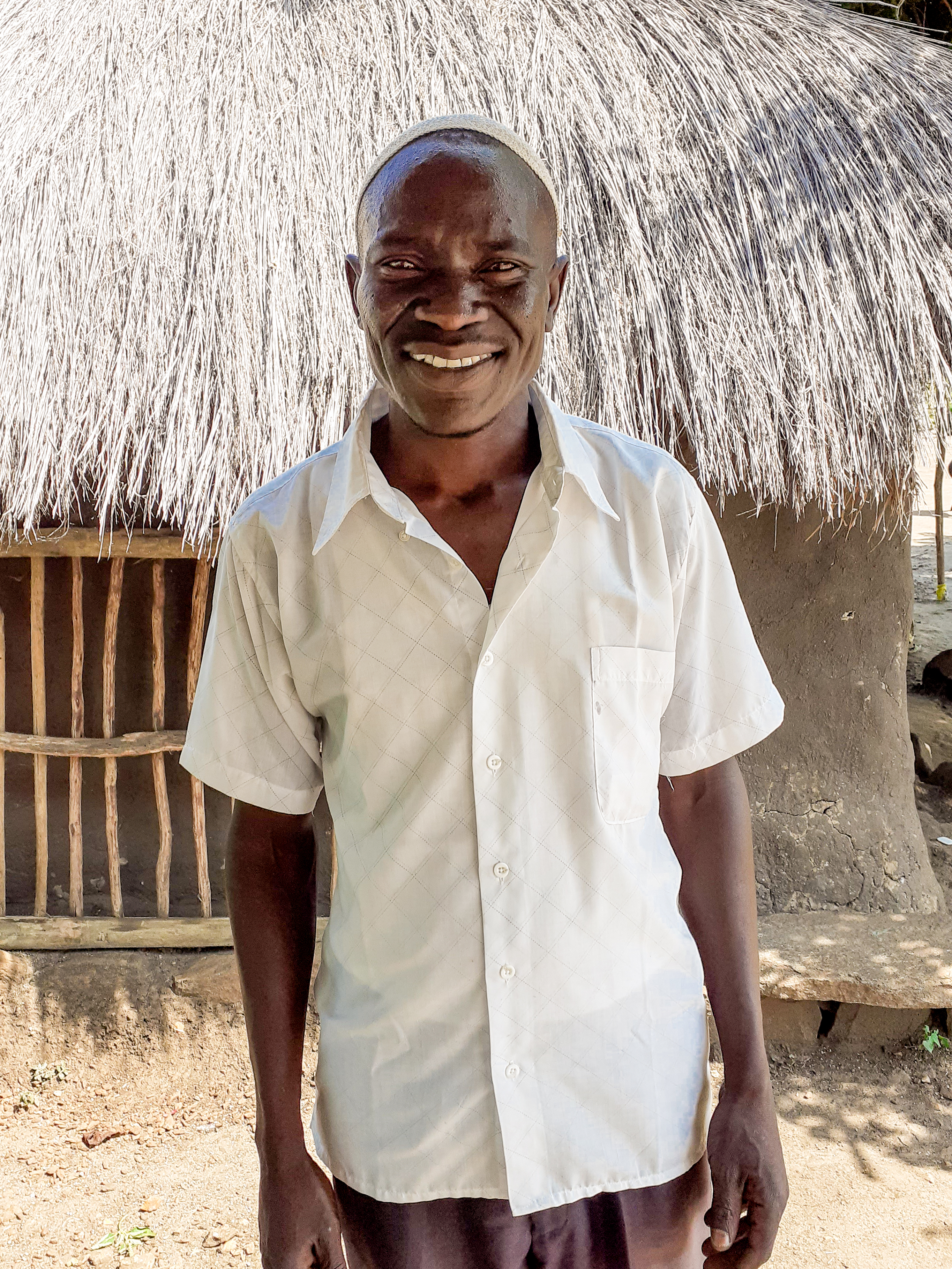 A person smiles for the camera.