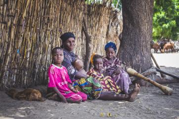 Salma and four children sitting together